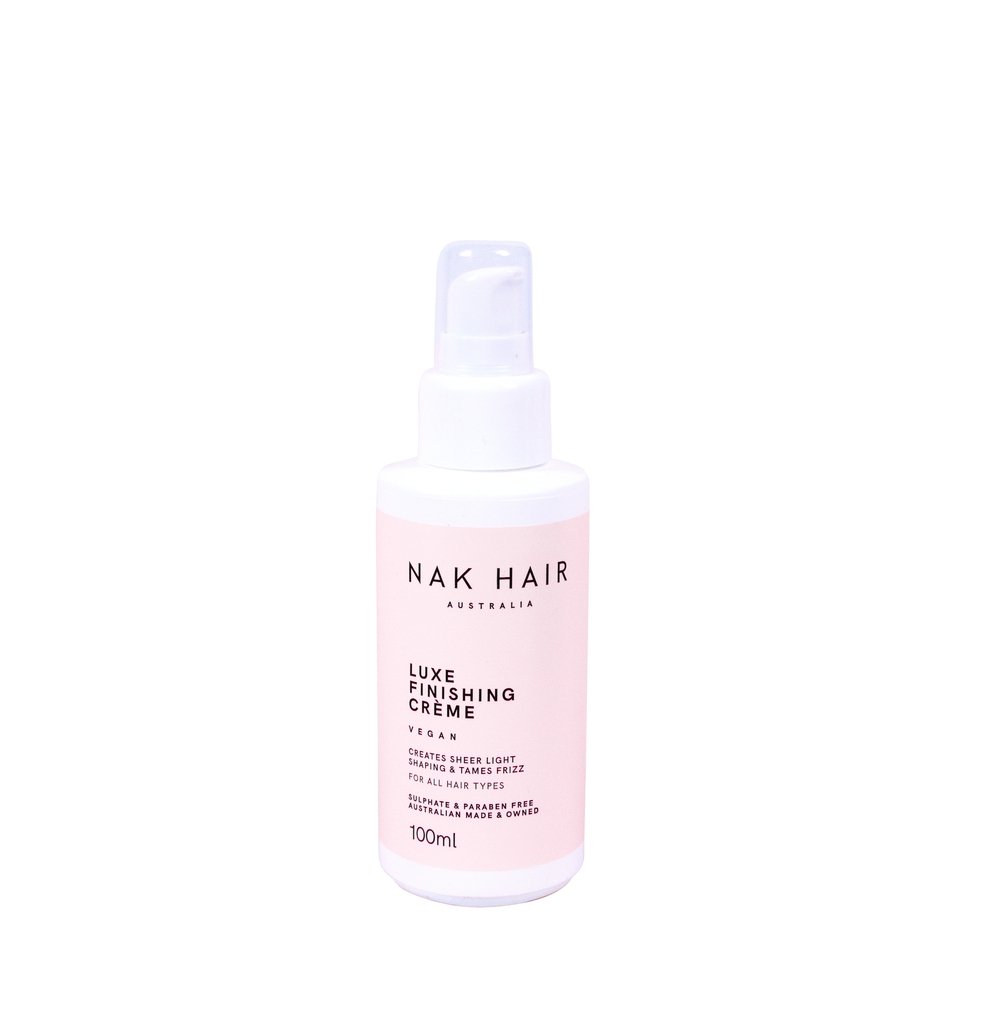 NAK Luxe Finishing Crème 100ml tube, showcasing its lightweight, frizz-taming formula designed to smooth flyaways, add shine, and enhance natural hairstyles for all hair types