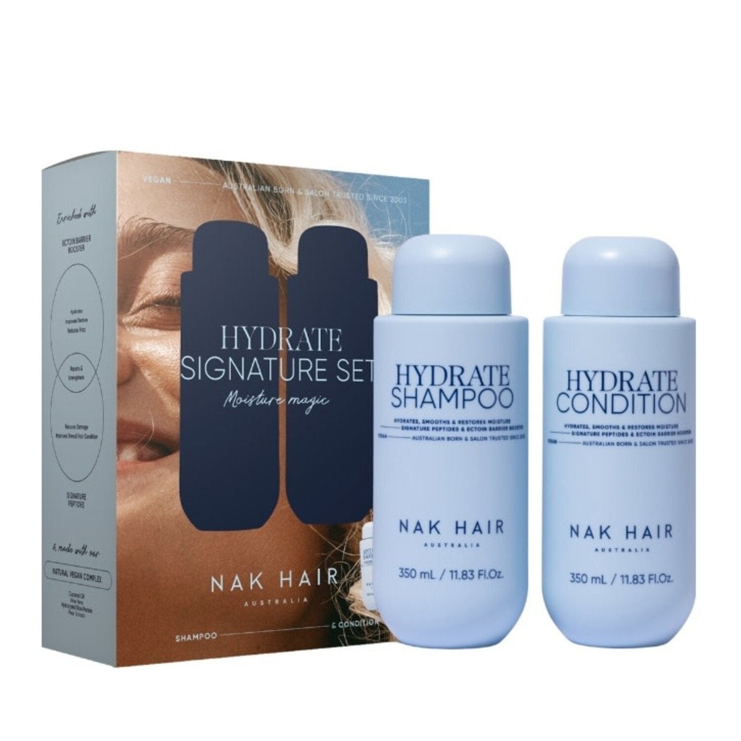 Nak Hair Hydrate Signature Set with shampoo and conditioner bottles and packaging on a white background