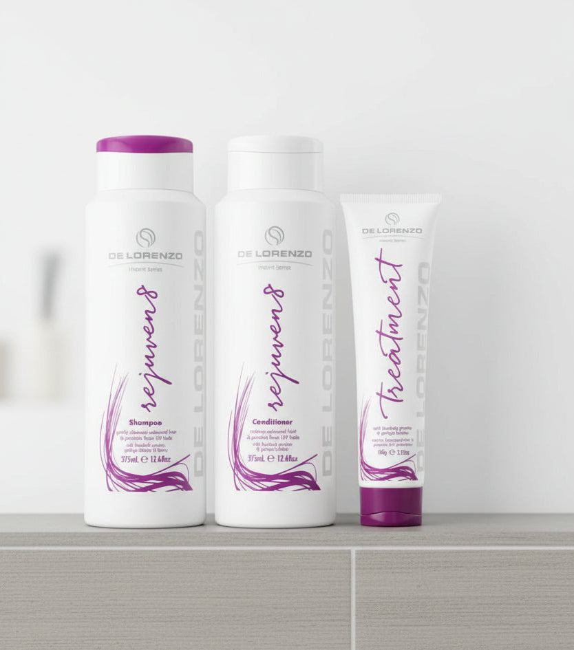 De Lorenzo Rejuven8 shampoo, conditioner, and treatment on a bathroom shelf 
background